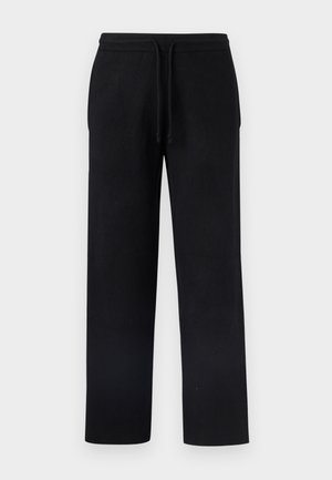 Svarte joggebukser med snøring i midjen, rett bendesign, myk tekstur og uten synlige mønstre eller detaljer.