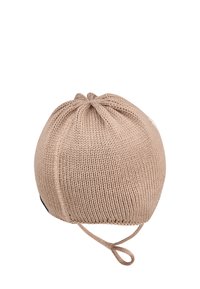 Knit cap in light brown, rounded shape with a drawstring at the base. Features ribbed texture and a small logo tag on the side.