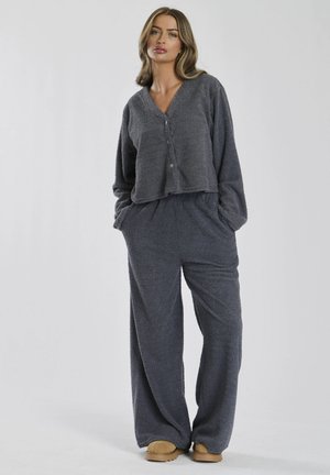 Gray, soft, textured loungewear set includes a button-up cropped top and wide-leg pants, featuring an elastic waistband and pockets.
