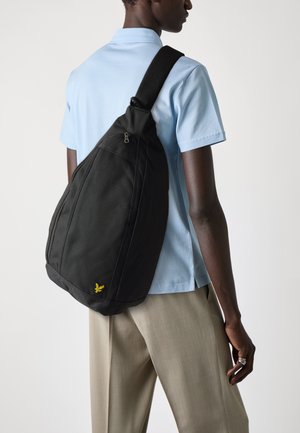 SLING BAG UNISEX - Axelremsväska - jet black