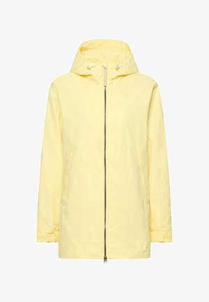Jasnopomarańczowa, żółta kurtka przeciwdeszczowa z kapturem, przednim zamkiem błyskawicznym i bocznymi kieszeniami, długimi rękawami oraz regulowanymi paskami na nadgarstkach.