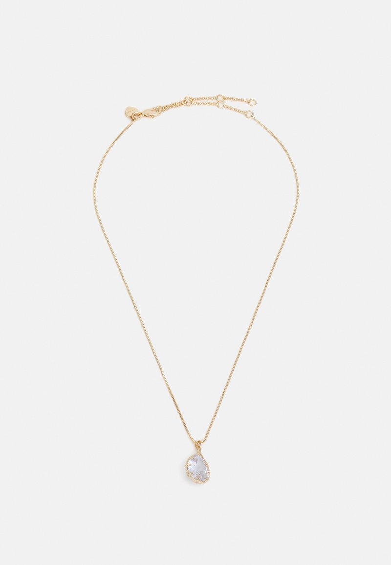 Collier délicat en chaîne dorée avec fermoir réglable et pendentif en forme de goutte avec pierre précieuse transparente.