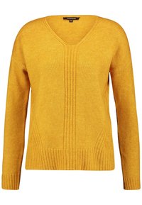Gele gebreide trui met een V-hals, geribbelde manchetten en zijpanelen met verticale getextureerde lijnen. Zachte stof met een reguliere pasvorm.
