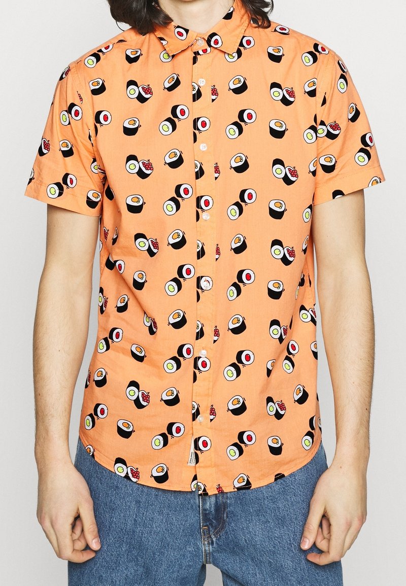 Short-sleeve button-up shirt in orange fabric, featuring a repeated sushi print in various colors. Relaxed fit with a classic collar.