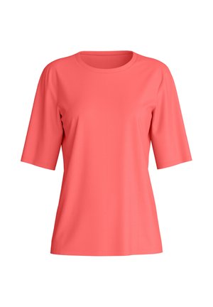 T-shirt couleur corail à manches courtes avec un col rond et une coupe décontractée, présenté sur un fond blanc.