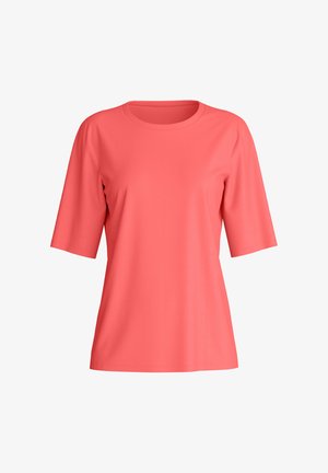T-shirt couleur corail à manches courtes avec un col rond et une coupe décontractée, présenté sur un fond blanc.
