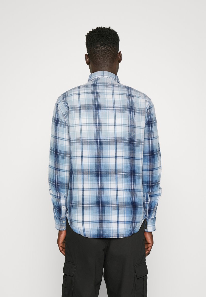 Blau karierte Langarmbluse aus gewebtem Stoff, mit einem normalen Kragen und Knopfmanschetten, sowie einem geraden Saum.