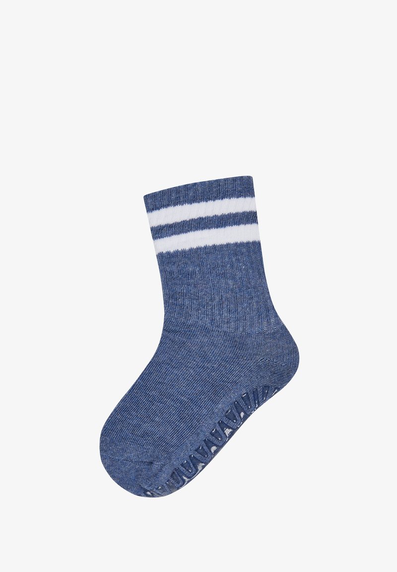 Blue knitted baby sock with two white horizontal stripes near the cuff and non-slip grips on the sole.