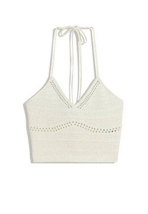 Witte gehaakte crop top met een V-hals en verstelbare tie straps. Heeft horizontale strepen en kleine uitsnijdingen door het geheel.