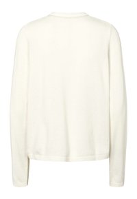 Crème kleurige trui met lange mouwen, een ronde halslijn en een geribde zoom. Gemaakt van zacht materiaal, met een eenvoudig en strak ontwerp zonder versieringen.