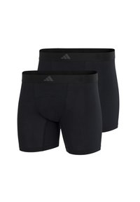 Svarta boxershorts i slät tyg, med en bred svart midja med en diskret logo och en formad fickdesign. Två par visas.