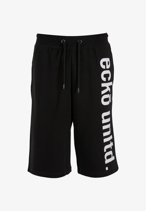 Mustat puuvillashortsit, joissa on elastinen vyötärö ja nauha. Vasemmalla puolella on valkoinen graafinen printti "ecko unlted."