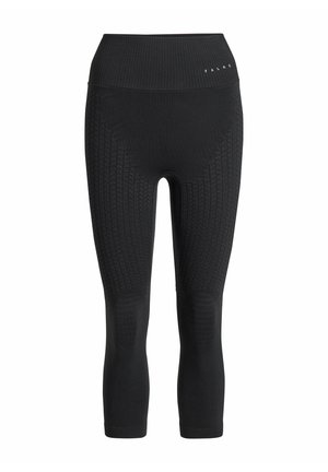 Leggings neri 3/4 realizzati in tessuto a maglia testurizzato. Presentano un ampio elastico in vita e dettagli decorativi lungo le gambe, con una finitura a costine.