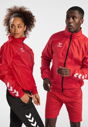 Hummel CORE XK SPRAY - Regnjakke / vandafvisende jakker - true red