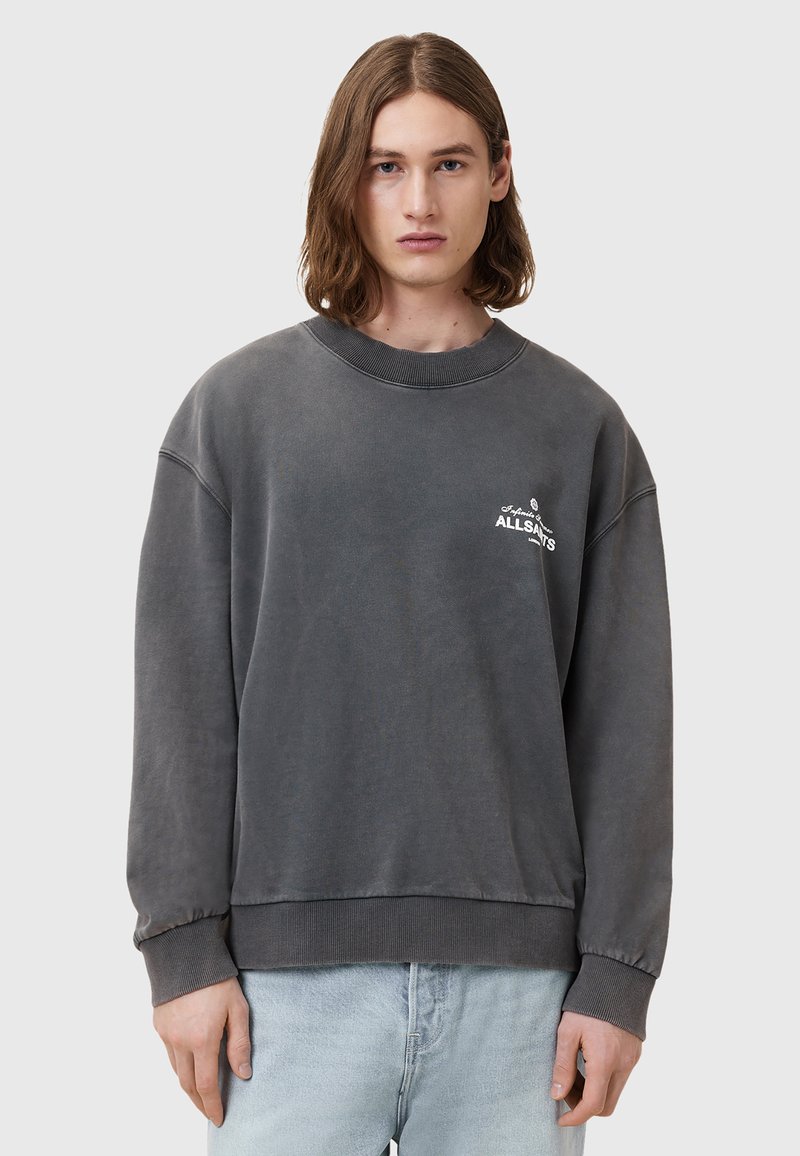 Szara, luźna bluza z ribbowanym kołnierzem i mankietami. Zawiera haftowane logo "AllSaints". Wykonana z miękkiej, teksturowanej mieszanki bawełny.