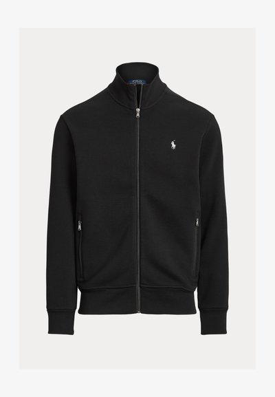 Svart glidelåsjakke med ståkrage, to glidelåslommer og lite hvitt Polo Ralph Lauren-logo på venstre bryst.