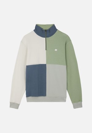 Quarter-zip sweatshirt with color blocks in cream, blue, green, and gray, featuring a small white elephant logo on the chest.