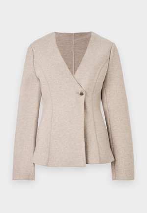 Smėlio spalvos vilnos mišinys švarkas su V formos iškirpte, ilgomis rankovėmis ir vieno mygtuko užsegimu. Jame yra siuvimo detalės ir praplėsta apačia.