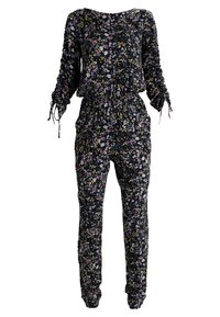 Blommig jumpsuit i svart tyg med längre ärmar, elastisk midja och rynkor vid ärmsluten med färgglada blommönster överallt.