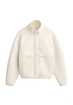 Off-white fleece jack met drukknoopjes, hoge kraag, geborduurde stroken over de borst en ritszakken aan de zijkant.