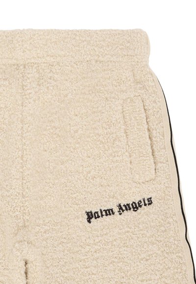 Beige fleecesweatpants met een gestructureerd oppervlak. Bevat een zijzak en zwarte geborduurde "Palm Angels" logo op de voorkant. Verticale strepen aan de zijkant.