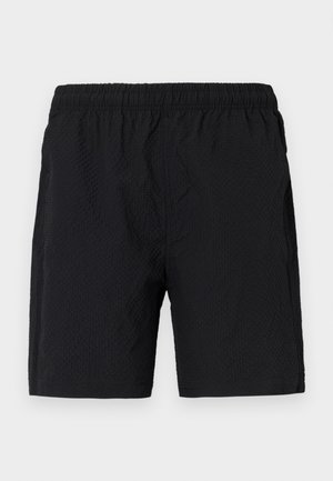 Shorts da nuoto neri realizzati in tessuto testurizzato, con una fascia elastica in vita e tasche laterali, dal design morbido.