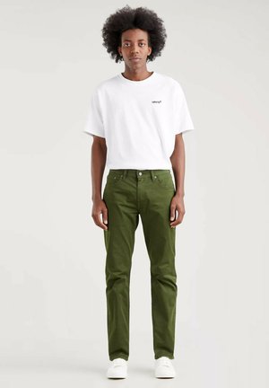 SU SATEEN GD - Trousers - greens