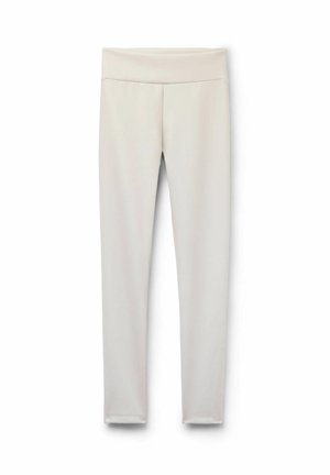 Helle beige Leggings aus einem glatten, elastischen Stoff, mit hohem Bund und figurbetontem Design, das sich am Knöchel verjüngt, ohne Muster oder Verzierungen.