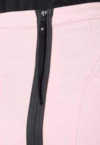 Pink fabric with a black zipper at the front, featuring a textured finish and outlined seams, creating a structured, tailored look.