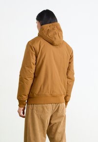 Dickies NEW SARPY JACKET - Lengva striukė - brown duck