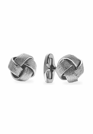 Boutons de manchette ton argent avec un design de nœud tissé texturé, présentés de face et de profil sur un fond blanc.