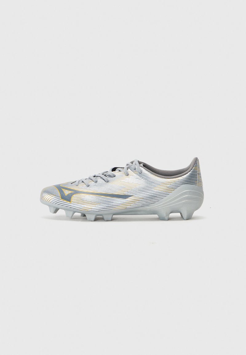 Light gray soccer cleat with textured stripes, accented in gold. Features a low-cut design and cleated sole for enhanced traction.