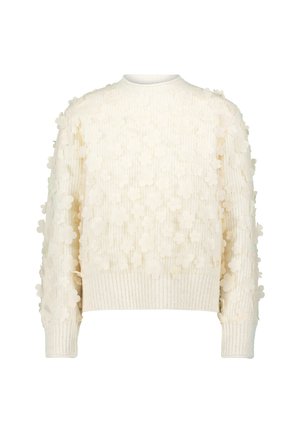 Kremowy sweter o prążkowanej fakturze, ozdobiony aplikacjami kwiatowymi rozmieszczonymi na całej powierzchni. Okrągły dekolt i długie rękawy.