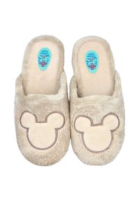 Un par de zapatillas de casa de felpa beige con parches en forma de orejas de ratón en la parte superior y plantillas azules etiquetadas "Calzados Anatómicos Natalia Gil."