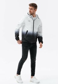 Ombre LIGHTWEIGHT SPORTS WITH EFFECT - Chaqueta de entrenamiento - black