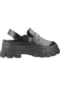 Zoccoli slingback in pelle nera con suola in gomma spessa e strutturata, punta arrotondata e una larga cinghia sopra per un migliore supporto.