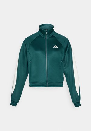 Teal cropped jakke med høj krave, lynlåslukning, hvide sidepaneler og ribbede manchetter. Har Adidas-logo på brystet. Glat tekstur.