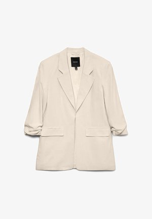 Beežist bleiser mittega sälgkragid, kaks esimest klapiga taskut ja kolmveerandvarrukad, laotatud valgele taustale.