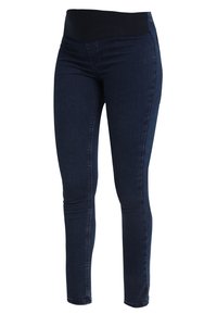 Jeans skinny de mezclilla azul oscuro con una cinturilla negra elástica. Presentan una textura suave y un diseño ajustado, terminando por encima del tobillo.