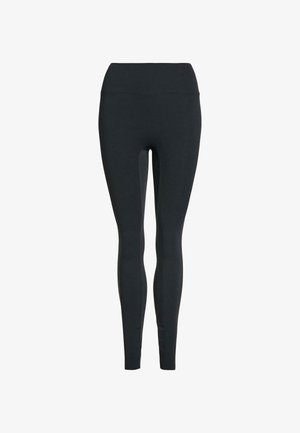 Leggings negros hechos de una tela elástica y lisa. Presentan una cintura alta y un diseño ajustado sin patrones ni adornos.