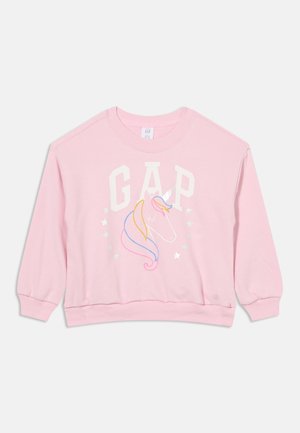 Sweat-shirt enfant rose clair avec logo GAP et une tête de licorne colorée entourée d'étoiles à l'avant.