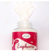 Open jar of white powder with red label reading "Euphorie" on a white background with spilled powder above.