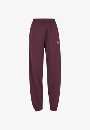 Bordowe spodnie dresowe z elastycznym pasem, zwężanymi nogawkami i małym białym logo. Wykonane z miękkiego, oddychającego materiału.