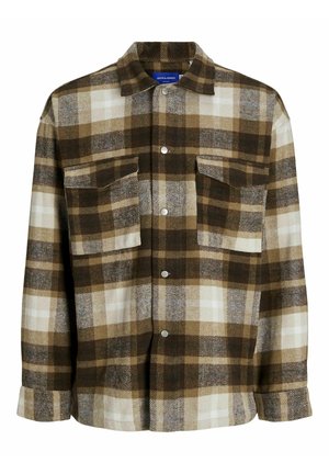 Brown and white plaid flannel shirt with a button-up front, two chest pockets, and a spread collar. Soft texture and loose fit.