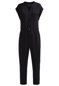 Combinaison noire à manches courtes, avec des boutons sur le devant, deux poches poitrine, une taille élastique et des chevilles fuselées pour un ajustement décontracté.