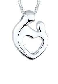 Silver pendant featuring an abstract heart shape with a cut-out center, attached to a chain with a woven texture.