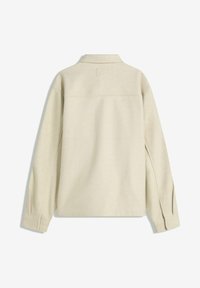 Beige, langärmelig overhemd met een kraag, met een soepele textuur en een ontspannen pasvorm. Het heeft een rechte zoom en zijkanten voor structuur.