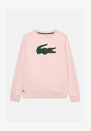 Roza sweatshirt z velikim zelenim logotipom aligatorja in rdečimi poudarki na sprednji strani ter z rebrastimi manšetami in spodnjim delom. Iz bombažnega materiala.