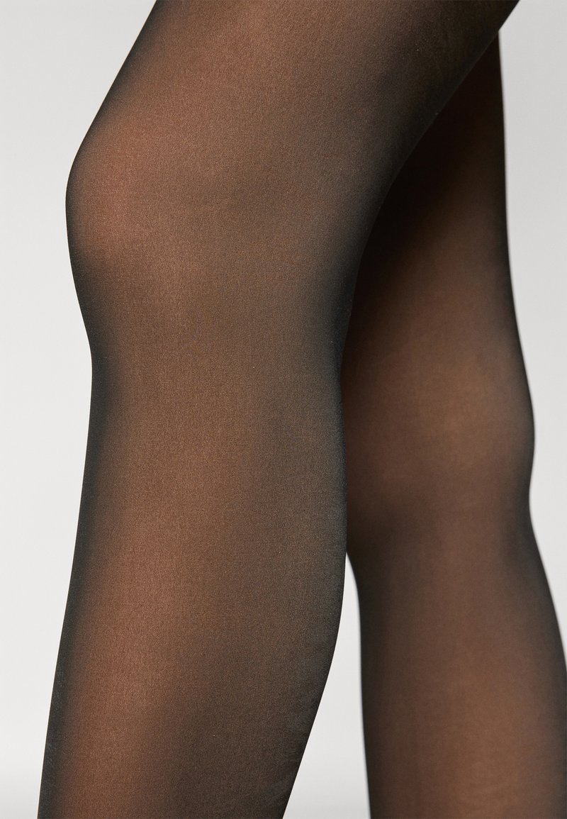 DIM WARM TRANSPARENT Tights black Zalando