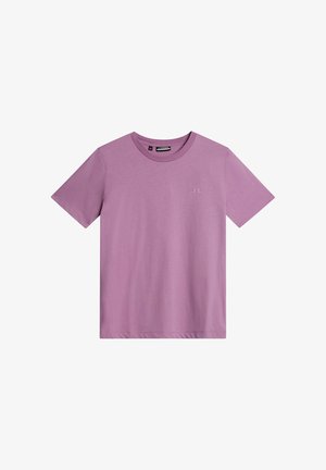Lilla kortærmet T-shirt lavet af blødt stof, med rund halsudskæring og subtilt logo-detail på forsiden.